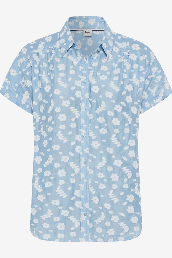 Blouse VIV légère en chambray bleu à motifs floraux blancs, idéale pour l&