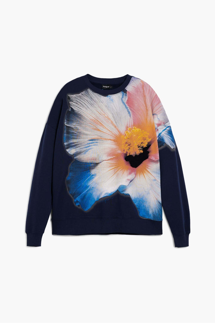 Chandail à grande fleur avec motif floral surdimensionné, coupe confortable et empiècements contrastants pour un style moderne.
