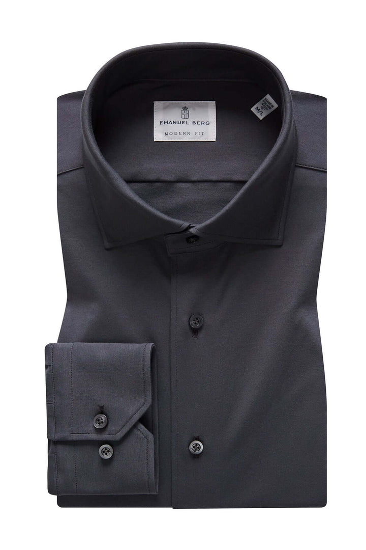 Chemise élégante à design épuré, col classique et poignets ajustables, parfaite pour le bureau et les événements formels.