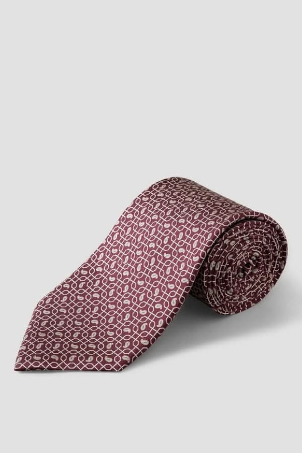 Cravate à motif géométrique en soie italienne avec motif raffiné et finition lustrée, parfaite pour occasions professionnelles et élégantes.