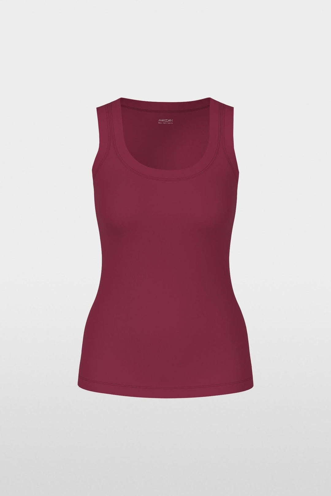 Haut sans manches en coton côtelé bordeaux avec coupe ajustée et finitions contrastées pour un look minimaliste et confortable.