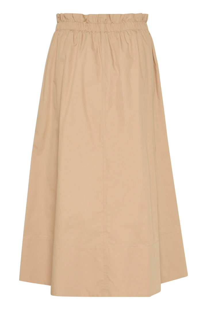Jupe longue en coton léger, couleur beige, avec taille élastique pour un ajustement confort optimal.