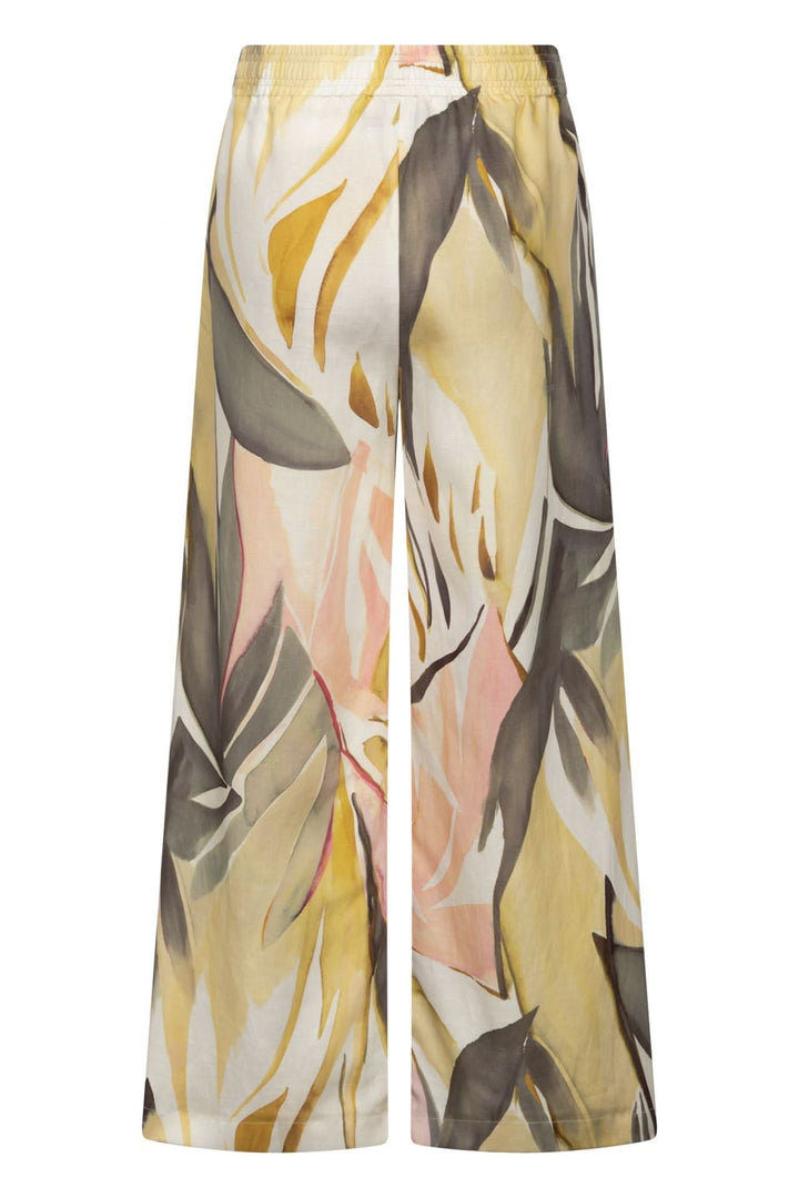 Pantalon Lizett fluide imprimé à taille élastique avec jambes larges et poches latérales, motif artistique, chic et confortable.
