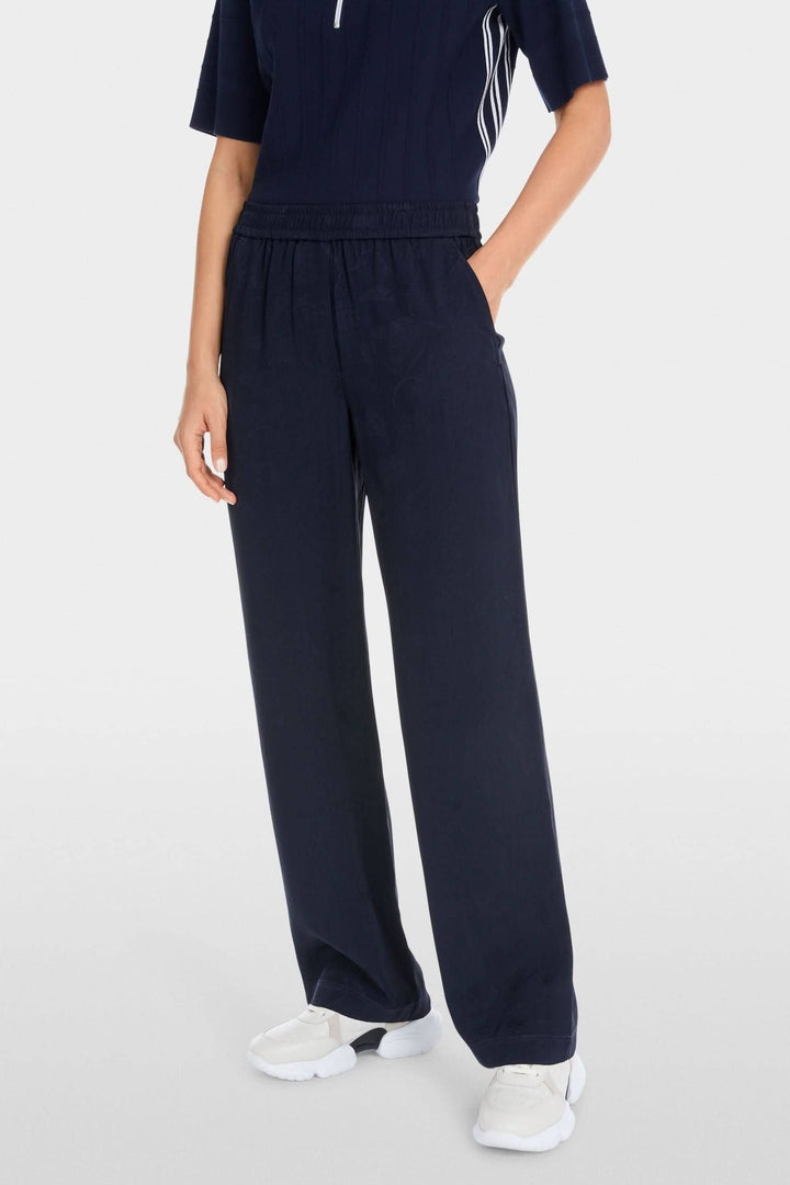 Pantalon à enfiler WASHINGTON, large et fluide, avec taille élastiquée et poches, parfait pour un look quotidien élégant.
