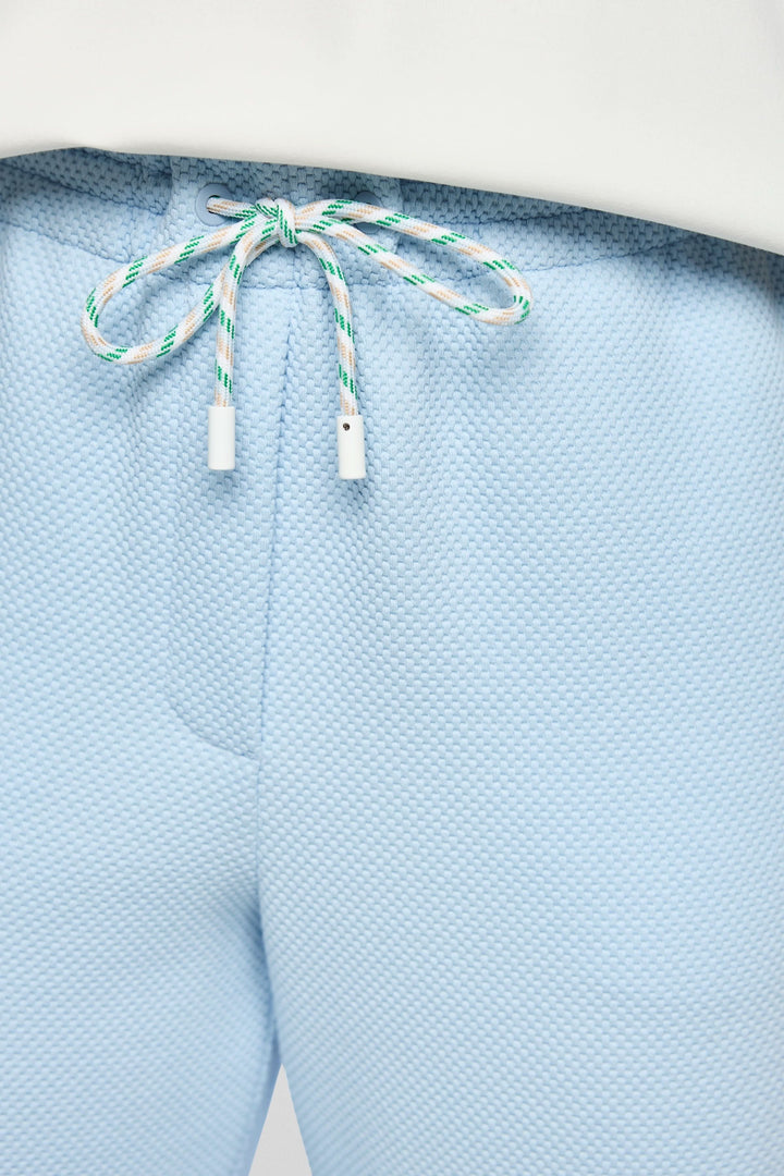 Pantalons à coupe large WASHINGTON avec taille élastique et cordon ajustable, style décontracté et moderne en bleu clair.