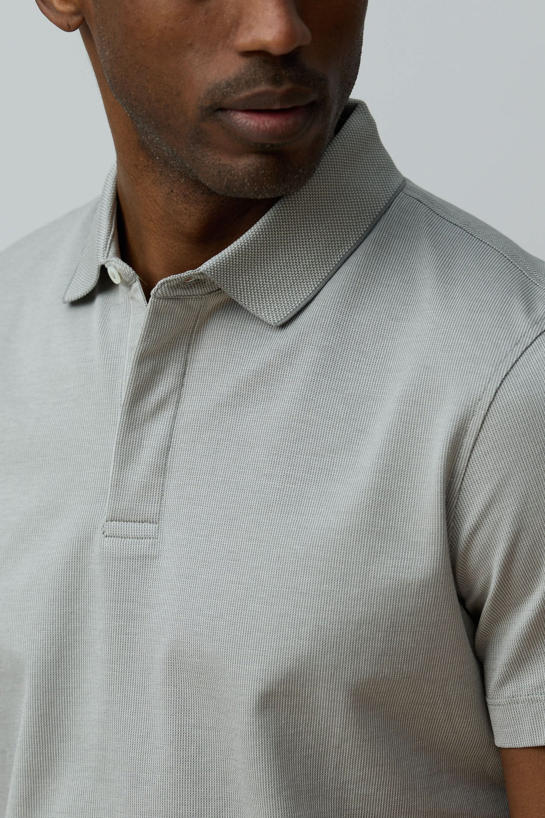 Polo en coton Corneliani ajusté, élégant et confortable avec maille fine texturée, col classique et manches courtes.