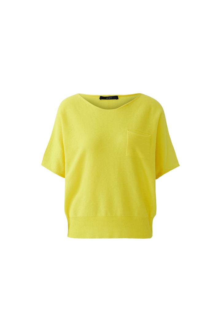Tricot fluide à manches courtes jaune avec poche poitrine, coupe décontractée et minimaliste en viscose.