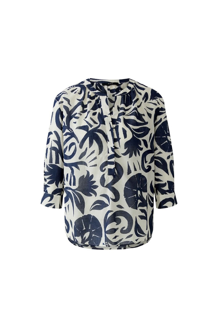 Tunique fluide à imprimé graphique à manches 3/4 avec encolure ouverte et patte de boutonnage, motif audacieux, style décontracté