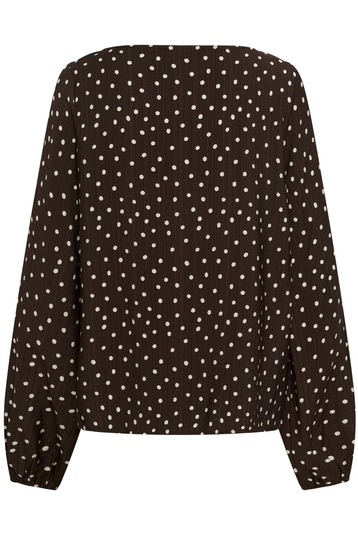 Front view of a white Kaffe polka-dot blouse for women with collarless details - Valérie Simon