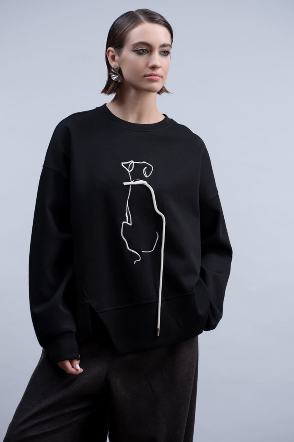 Front view of a women's blue Haako dog-print sweater - Valérie Simon