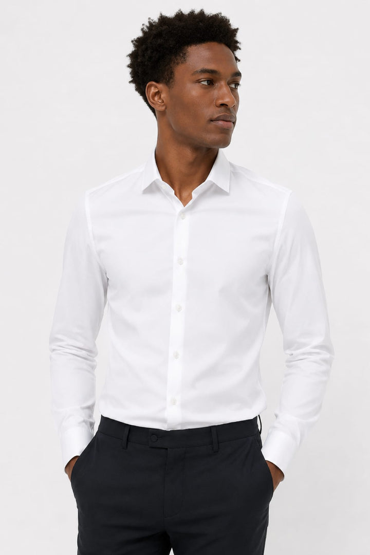 Front view of a white Eton dress shirt for men with a classic collar - Valérie Simon