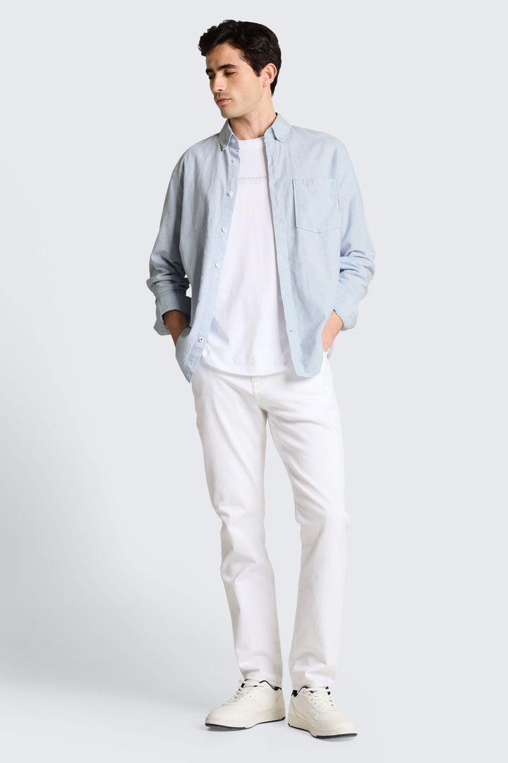 Vue de face chemise sport rayée Tom Tailor pour homme bleu avec bandes blanches et col boutonné - Valérie Simon