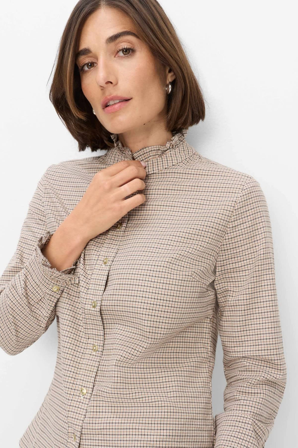 Front view of the women's ruffled stand-collar blouse by Brax
