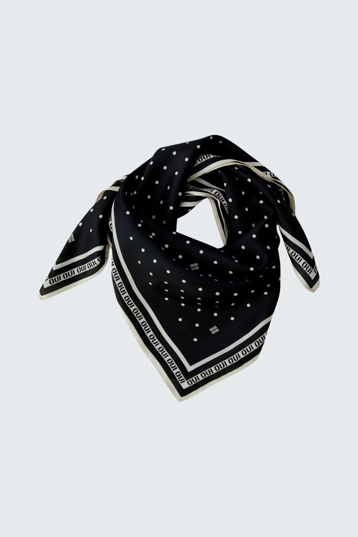 Side view of a blue Oui polka-dot scarf navy with white details - Valérie Simon