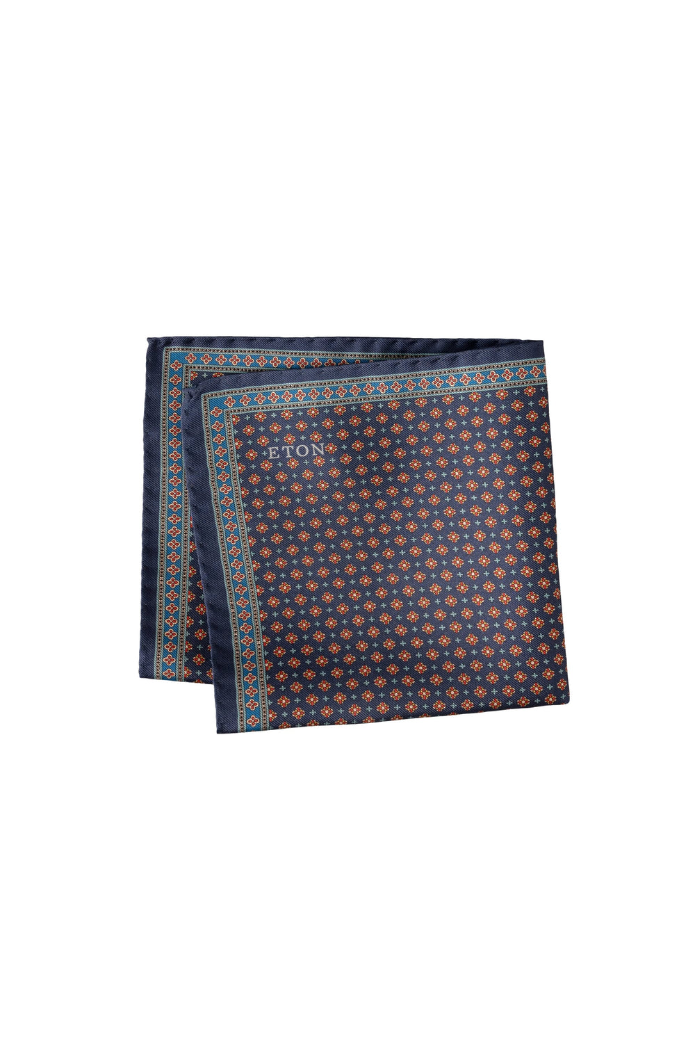 Close-up of the Eton men's blue pocket square with a micro-pattern by Valérie Simon