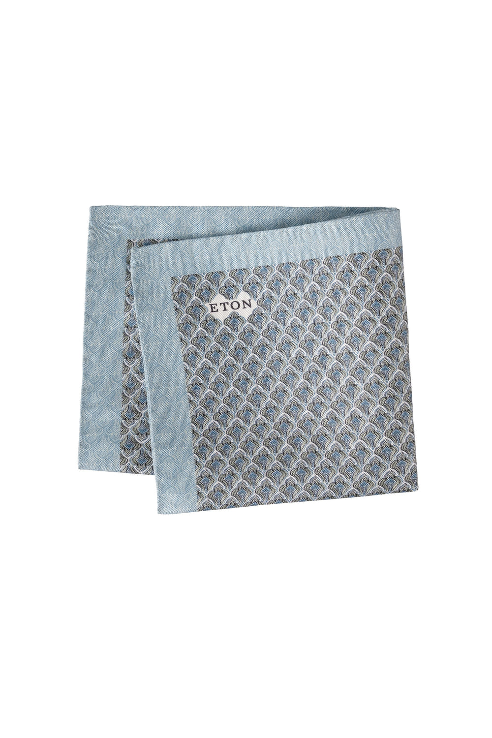 Close-up of a men's Eton pocket square in silk with a colorful geometric pattern - Valérie Simon