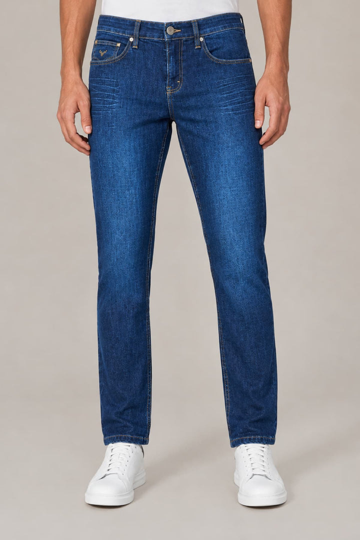 Vue latérale jean Black Bull coupe moderne pour homme bleu foncé avec coutures contrastées - Valérie Simon