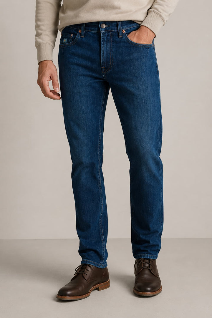 Vue latérale jean extensible Black Bull pour homme noir avec coutures apparentes - Valérie Simon