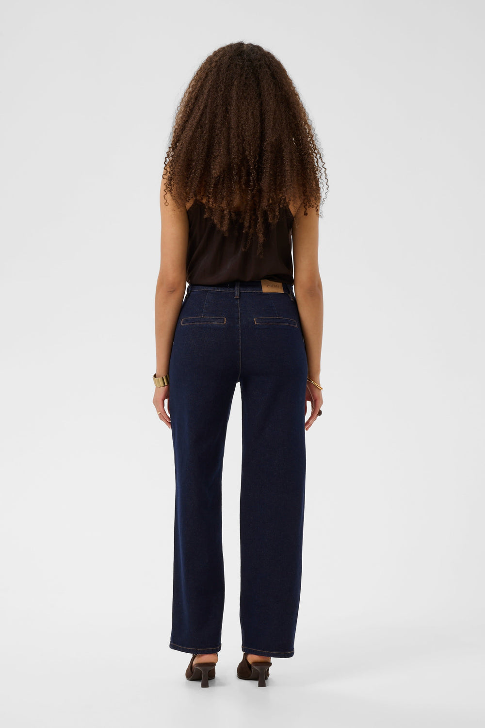 Side view of women's straight-leg blue denim jeans Cream - Valérie Simon