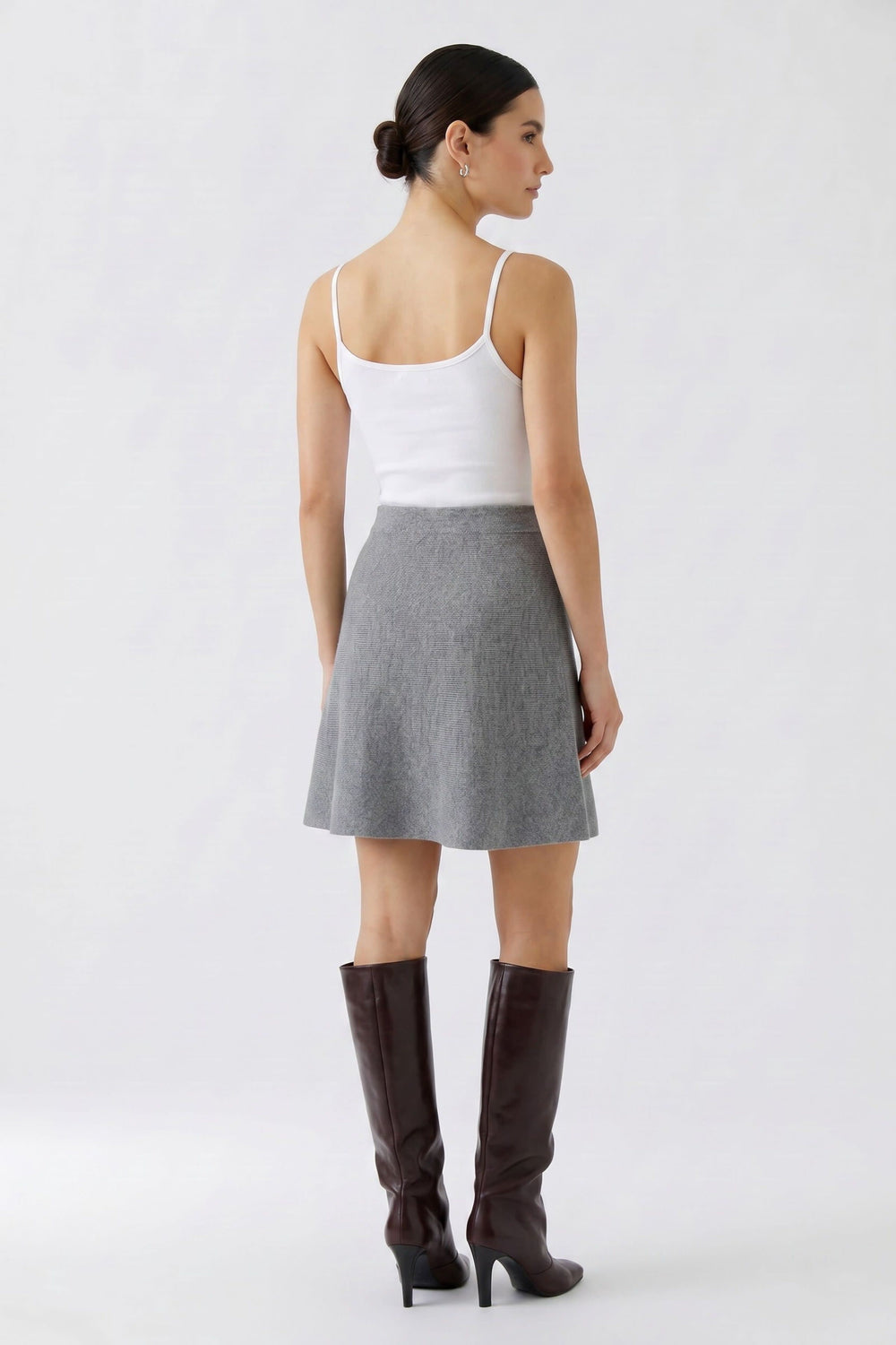 Women's short flared plaid skirt, front view Oui