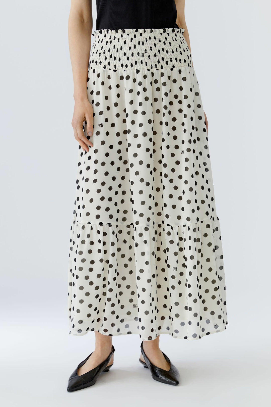 Side view of a long black-and-white polka-dot skirt for women Oui - Valérie Simon