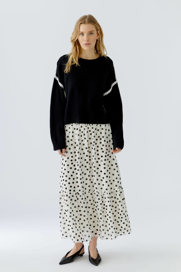 Front view of a long black-and-white polka-dot skirt Oui for women - Valérie Simon
