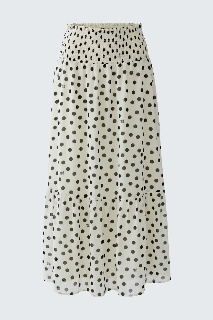 Front view of a long black-and-white polka-dot skirt for women - Valérie Simon
