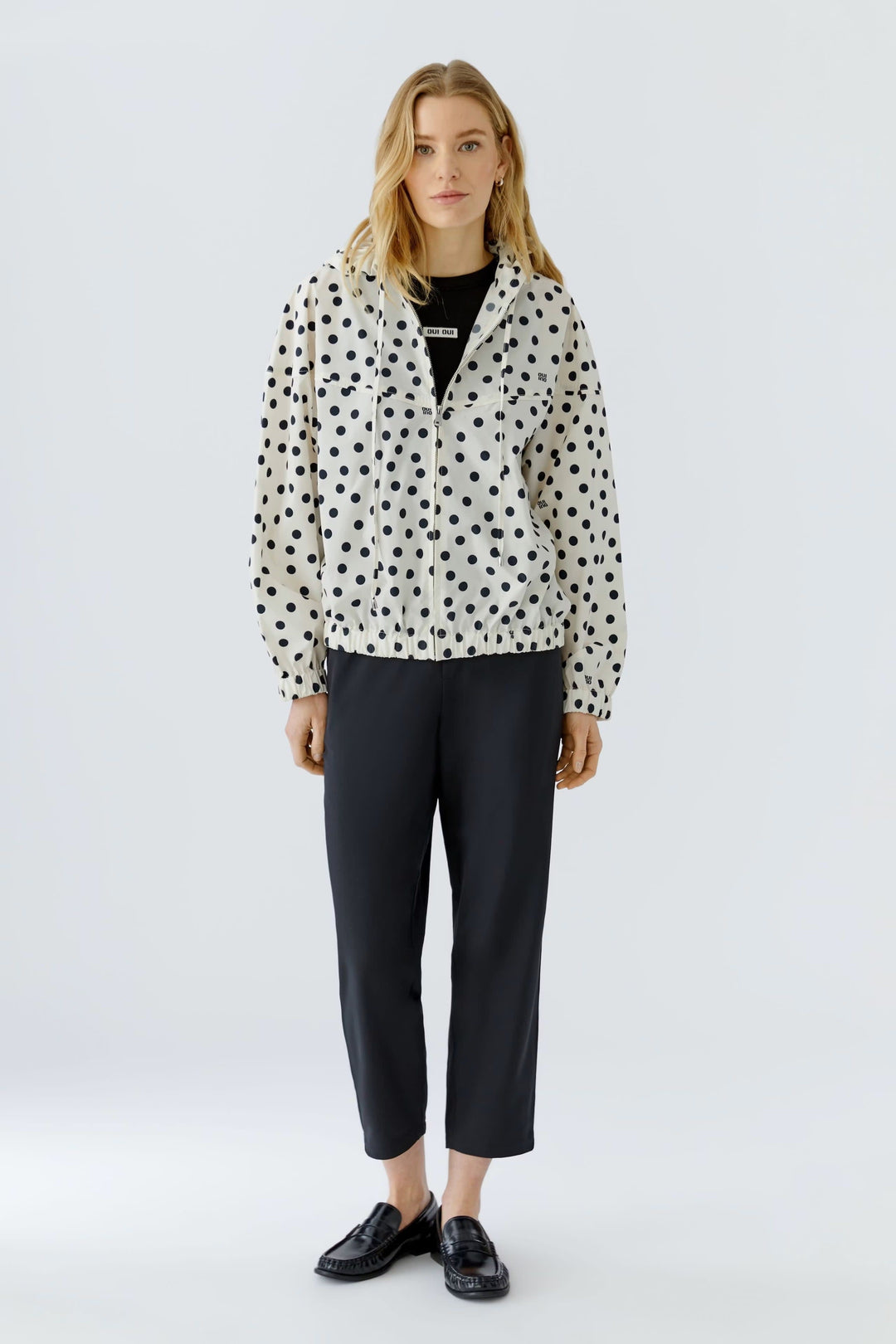 Front view of a black-polka-dot coat Oui for women in beige - Valérie Simon