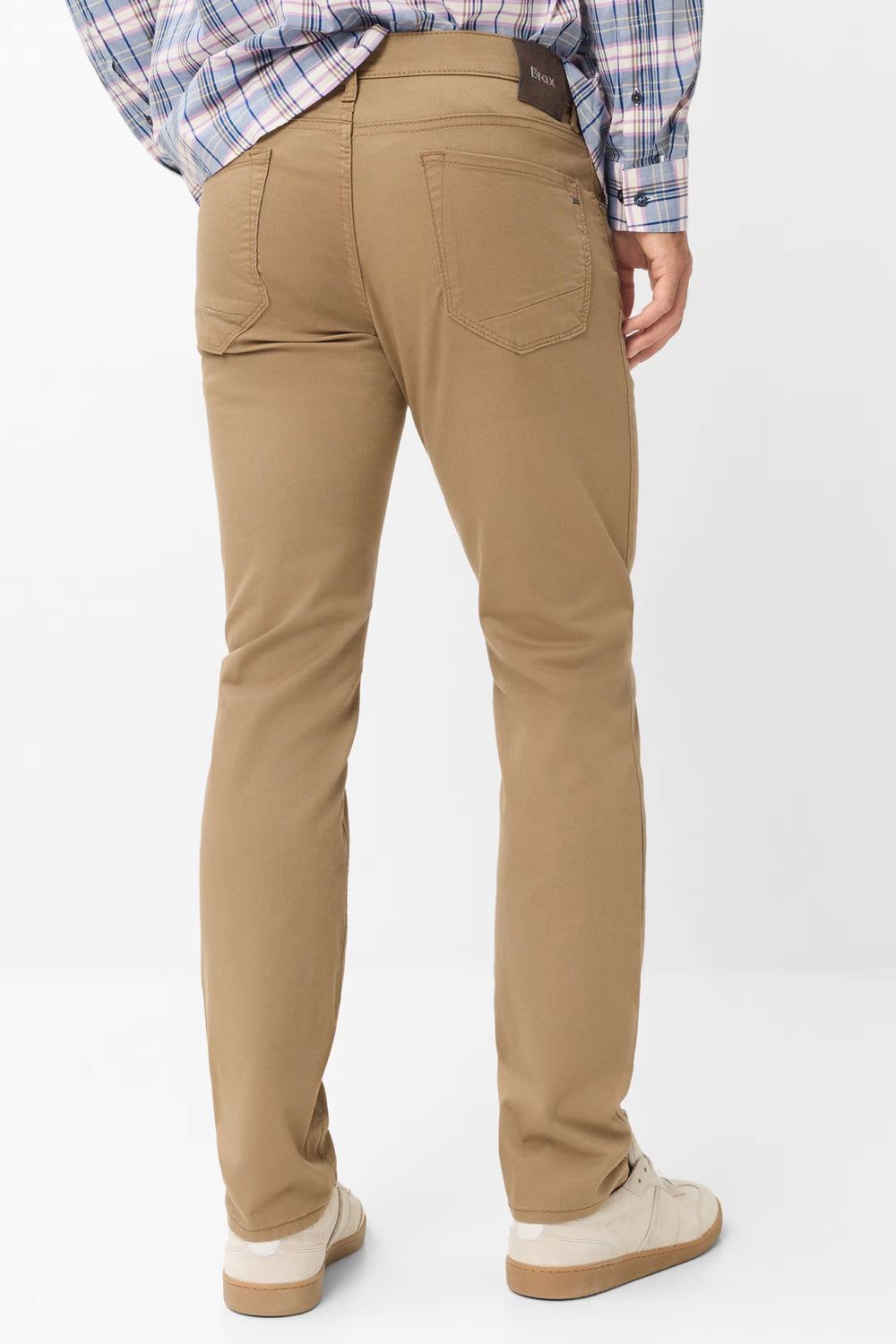 Front view of men's slim-fit chino pants by Brax