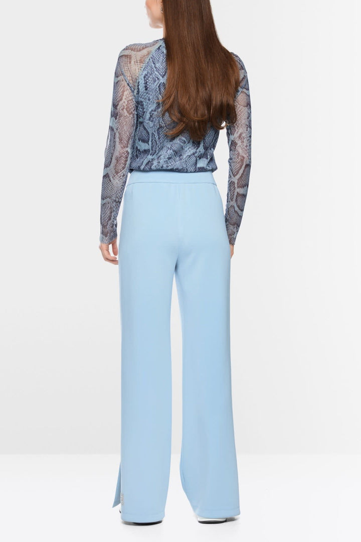 Side view of beige Wedi Marc Cain joggers with ribbed details - Valérie Simon