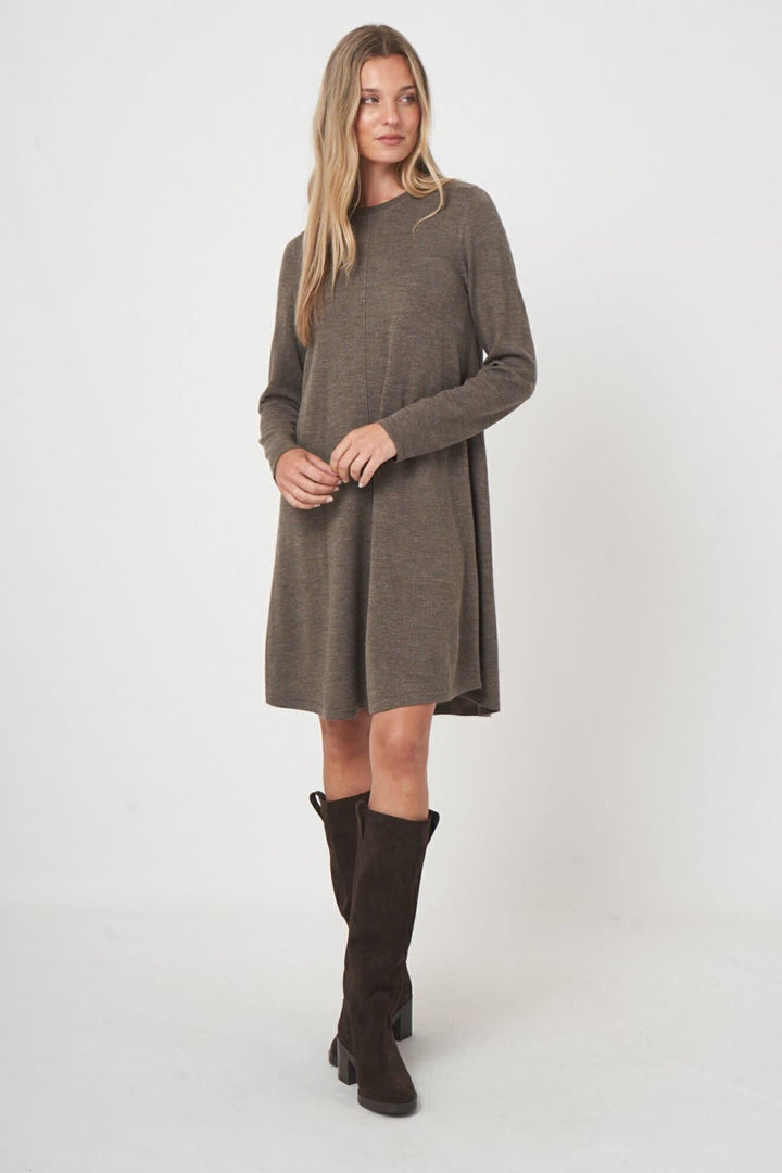 Front view of a flared knit dress Repeat Cashmere in red with textured details by Valérie Simon