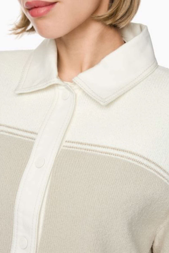 Side view of a beige Marc Cain women&