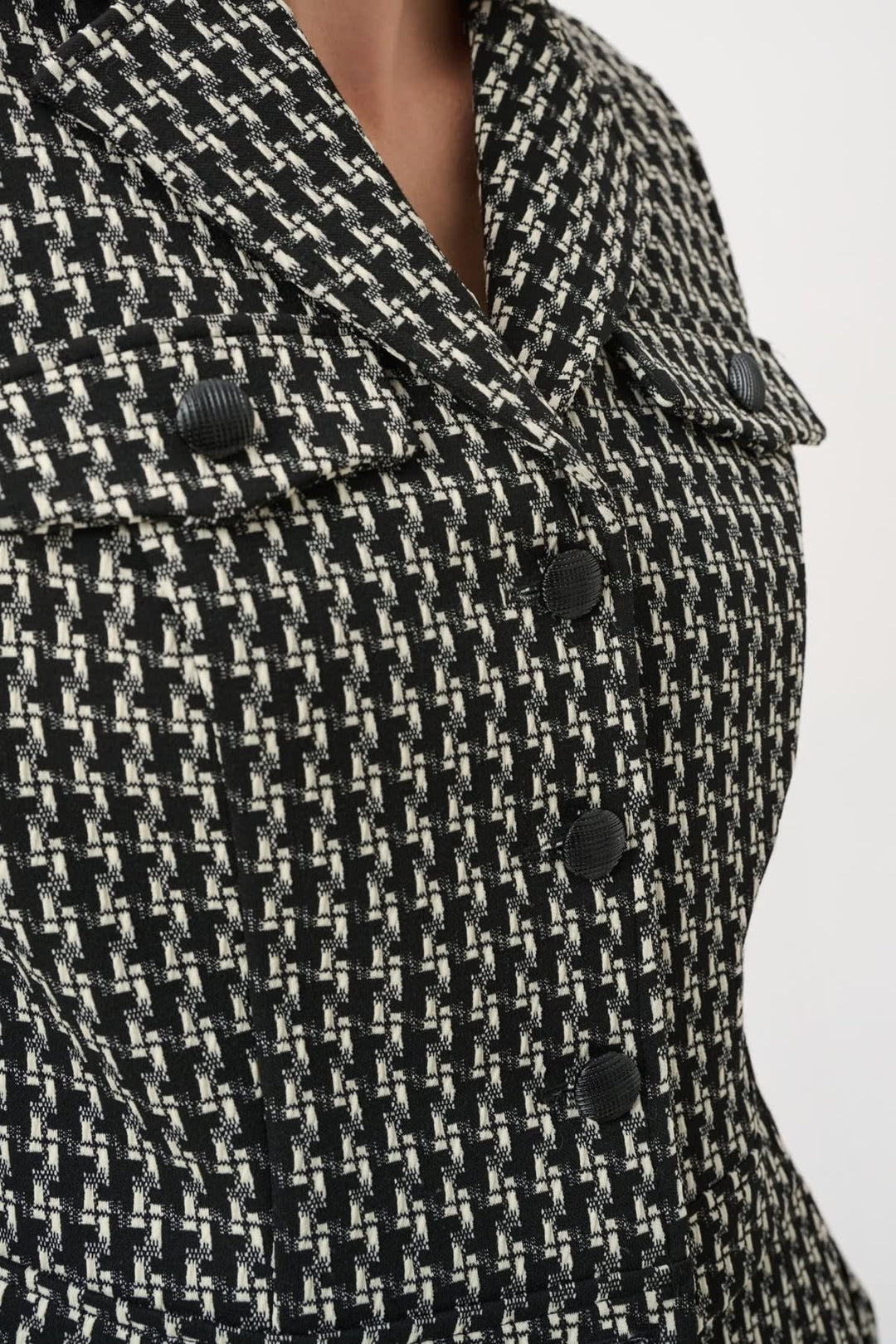 Front view of an elegant white textured Joseph Ribkoff women&