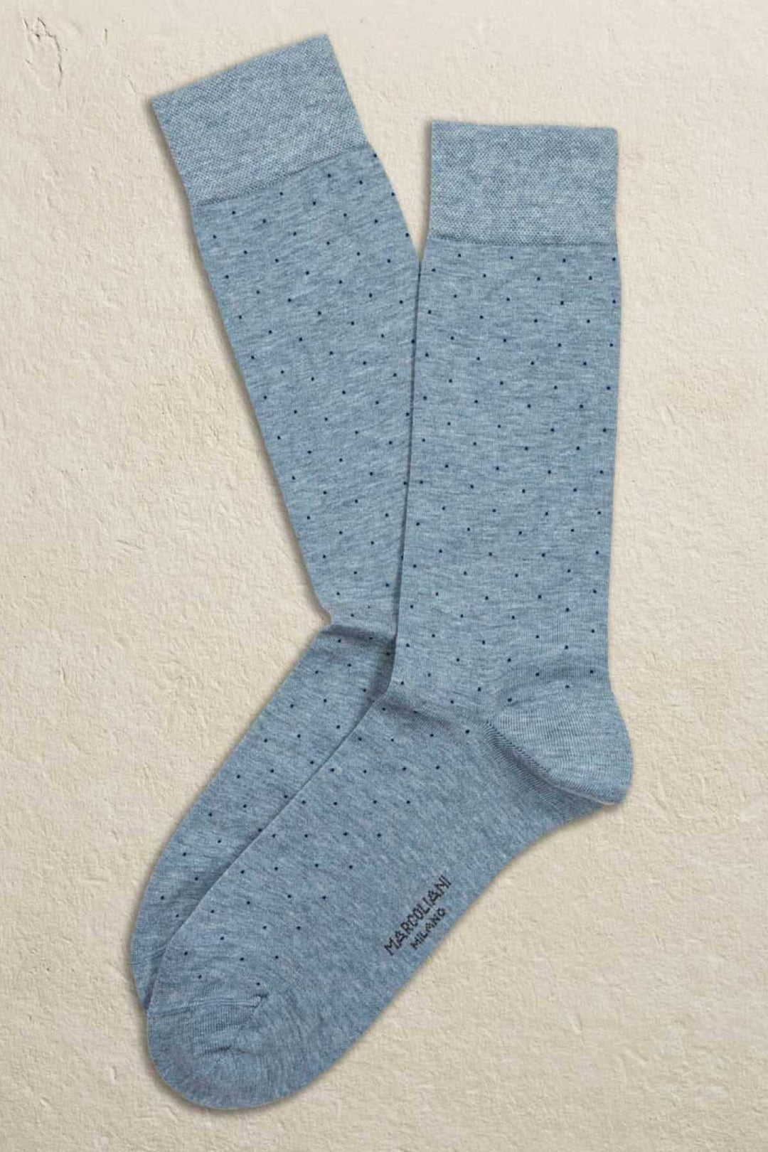 Chaussettes italiennes Marcoliani en coton bleu à pois, modernes et stylées pour un look élégant.