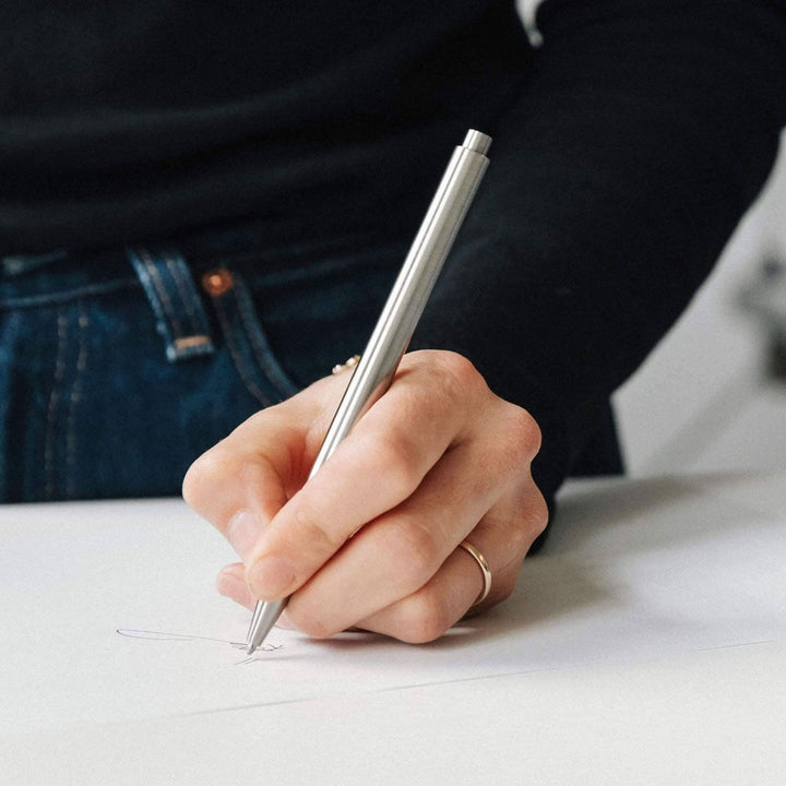 Main image of a person using the sleek Crayon Modern Fuel on a clean white surface.