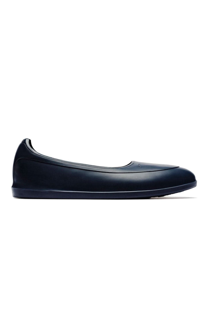 Galoche marine classique, élégante et imperméable, idéale pour affronter la pluie et la neige avec style.
