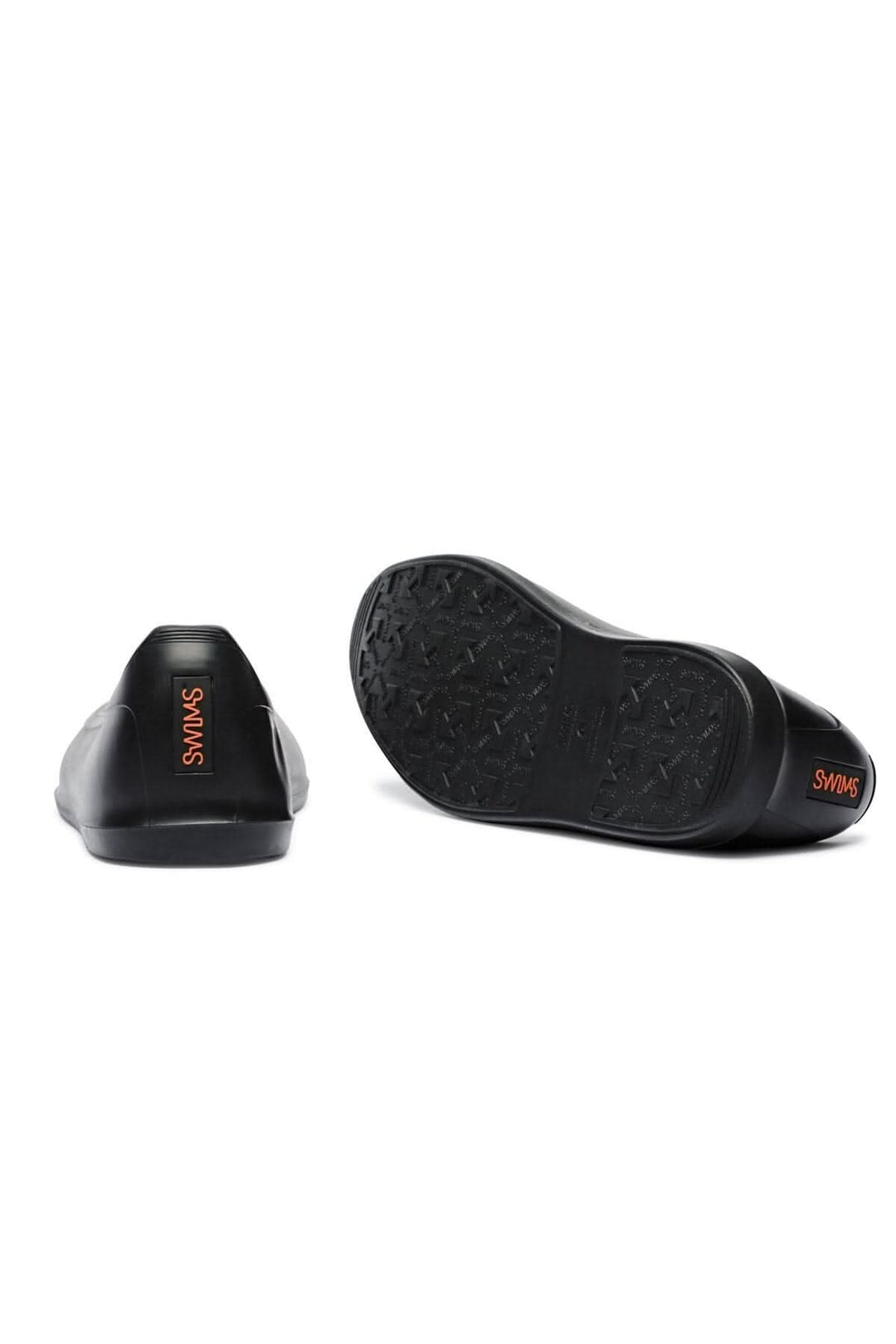 Galoche noire SWIMS vue arrière, design moderne et utilitaire, idéale par temps humide.