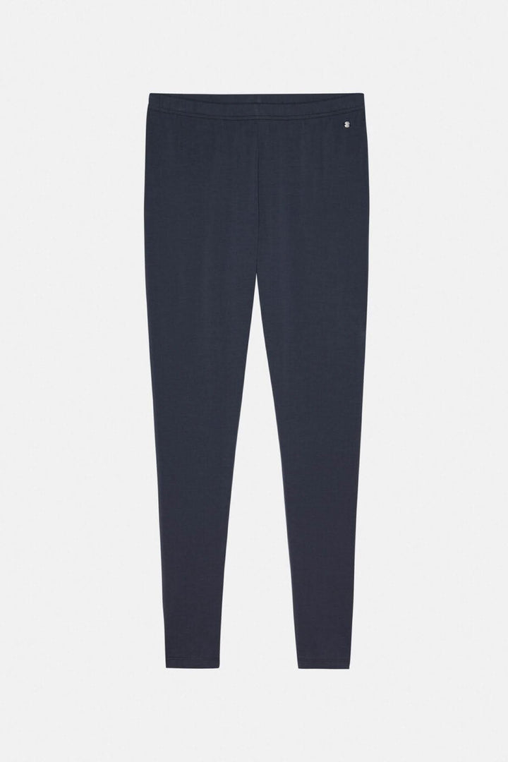 Legging basique noir ajusté en coton bio, taille haute et élastique, idéal sous une tunique ou cardigan.