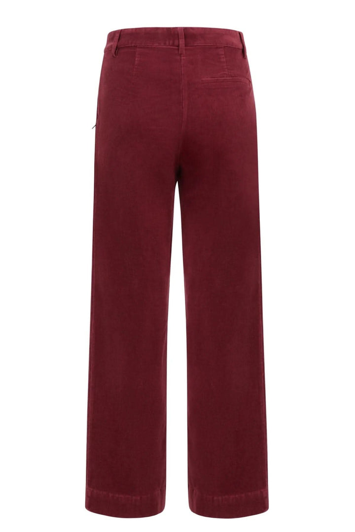 Vue arrière du pantalon Petra en velours côtelé, avec jambes larges et poche arrière.