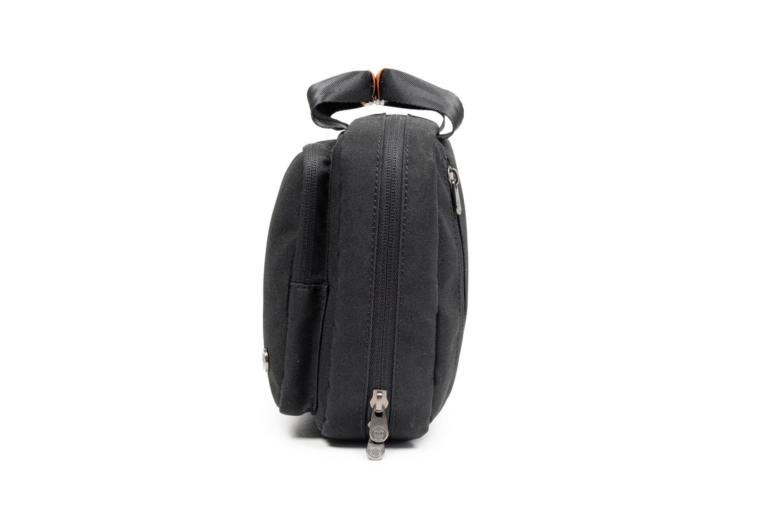 PKG Simcoe recycled accessories bag side view showcasing sleek design and zipper details.