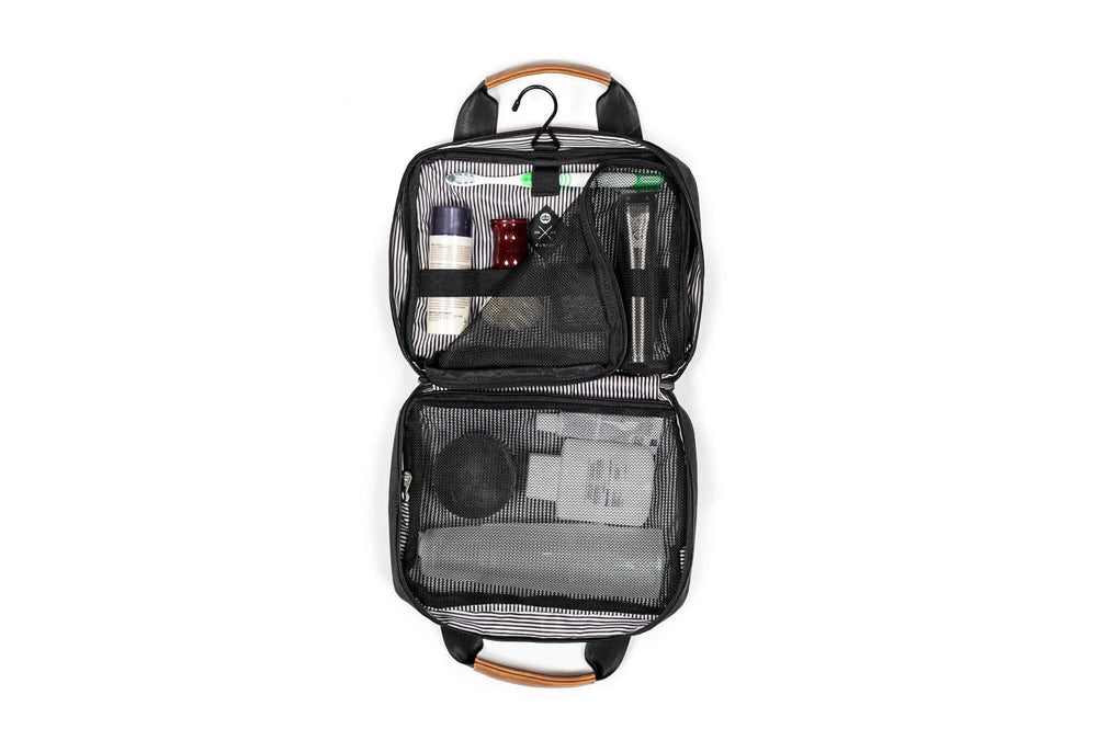 PKG Simcoe recycled essentials bag, organized toiletry storage with elastic organizers and hanging hook.