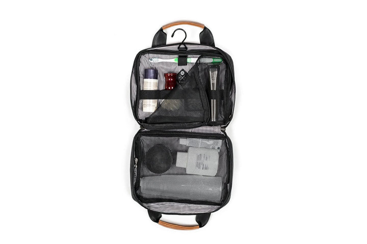 PKG Simcoe recycled essentials bag, organized toiletry storage with elastic organizers and hanging hook.