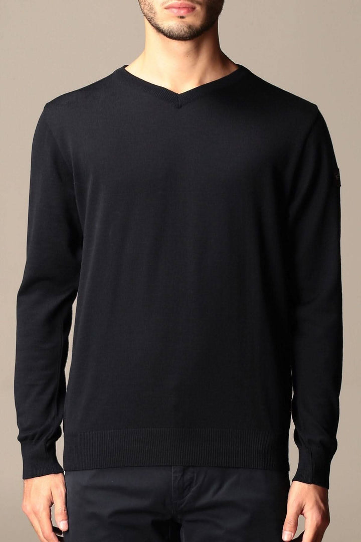 Pull en laine noir à col en V avec manches longues et badge Paul &amp; Shark, offrant confort et élégance.