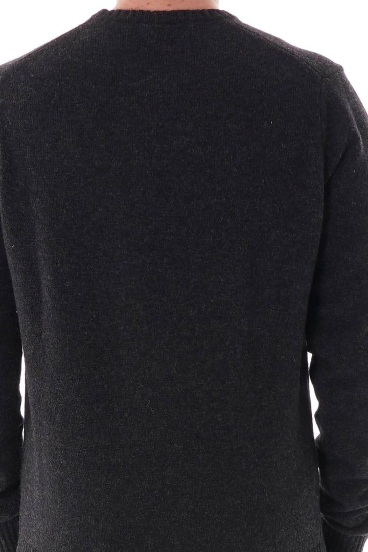 Pull en laine Shetland Paul &amp; Shark vu de dos, col rond, en maille noire, mettant en avant la qualité et l&