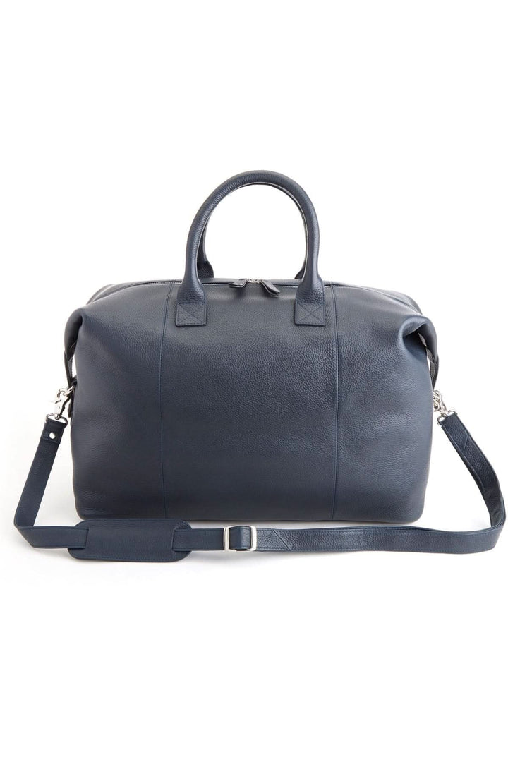 Sac de sport moyen en cuir, design raffiné, idéal pour le voyageur contemporain.
