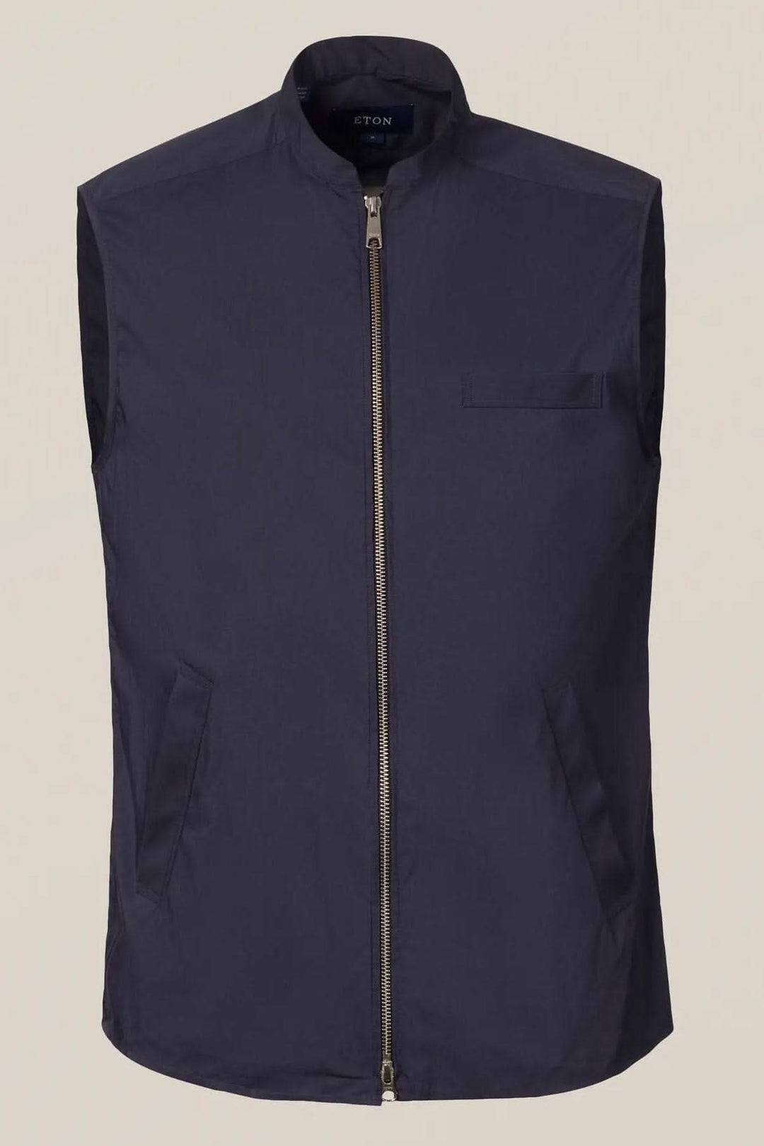 Veste sans manches élégante, déperlante et contemporaine, parfaite pour la superposition et l&